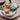 Photo Hand-painted wooden Easter eggs in a basket - Ukrainian handicrafts Hand-painted wooden Easter eggs in a basket - Ukrainian handicrafts