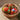 Photo Colorful hand-painted wooden Easter eggs in a basket - Ukrainian Petrykivka painting Colorful hand-painted wooden Easter eggs in a basket - Ukrainian Petrykivka painting