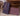 Photo Handcrafted Fish wall decoration on purple wood Handcrafted Fish wall decoration on purple wood
