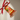 Photo Christmas bell made of wood, red and gold Christmas bell made of wood, red and gold