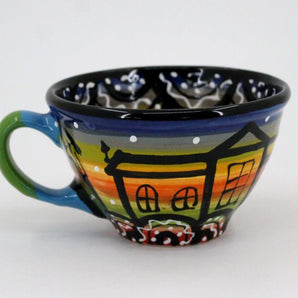 Beautiful ceramic coffee mugs with house motifs