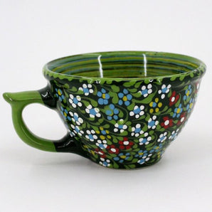 Pottery cup with floral pattern hand painted