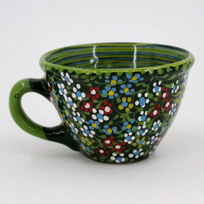 Pottery cup with floral pattern hand painted