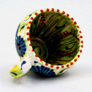 Beautiful ceramic teacup with cornflowers