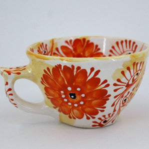 Cute ceramic mug with orange flowers