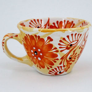 Cute ceramic mug with orange flowers