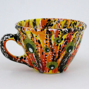 Colorful ceramic teacup with abstraction pattern