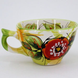 Beautiful ceramic teacup with poppies