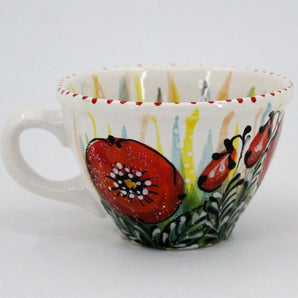 Large ceramic coffee mug with poppies