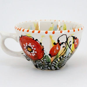 Large ceramic coffee mug with poppies