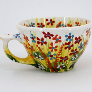 Beautiful ceramic cup with floral pattern