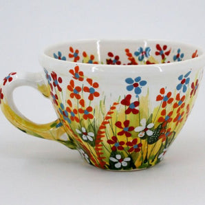 Beautiful ceramic cup with floral pattern