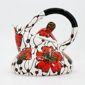 Extravagant teapot with poppies