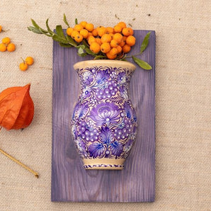 Wooden wall decor like small vase for dry flowers