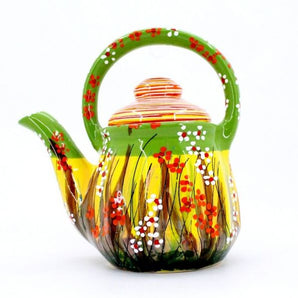 Funny teapot made of clay, hand-painted