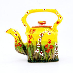 Happy teapot made of clay hand painted