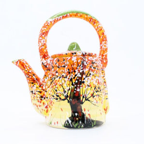 Pottery teapot with autumn motifs