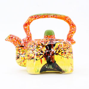 Original ceramic teapot with autumn motifs