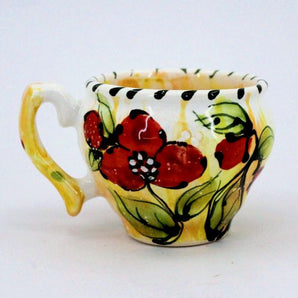 Pottery cup with poppies