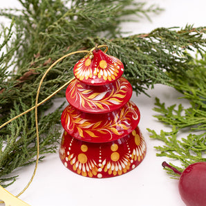 Golden Christmas bell decoration in the shape of Christmas tree