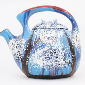 Original ceramic teapot hand-painted with winter motifs