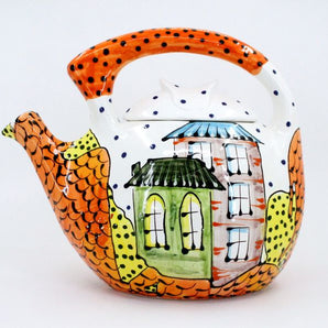 Large ceramic teapot with house motifs