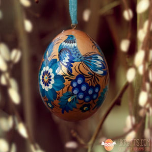 Ukrainian wooden Easter egg pysanka, gold