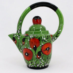 Designer clay teapot with poppies