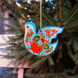 Kunstvoll bemalter Vogel - Osterschmuck aus Holz - Ukrainische Petrykiwka-Malerei