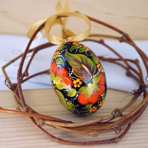 Wooden Easter egg with hand-painted bird