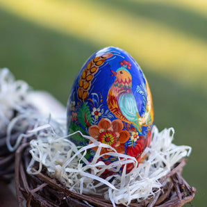 Traditional Hand-painted wooden Easter egg with bird, ostrich egg size