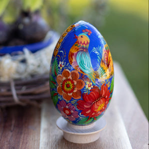 Traditional Hand-painted wooden Easter egg with bird, ostrich egg size