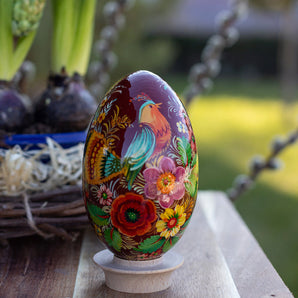 Hand-painted wooden Easter egg with bird, ostrich egg size