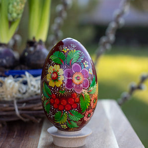 Hand-painted wooden Easter egg with bird, ostrich egg size