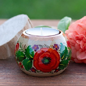 Handmade candle holder with floral pattern