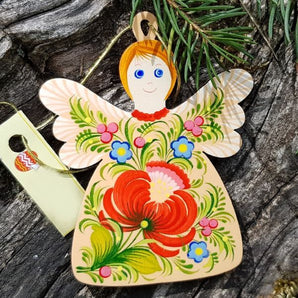 Christmas angel made of wood to hang, delicately painted