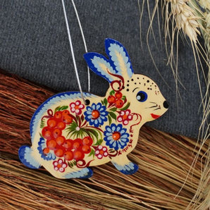 Beautiful Easter ornamnets made of wood - Easter bunny with flower pattern