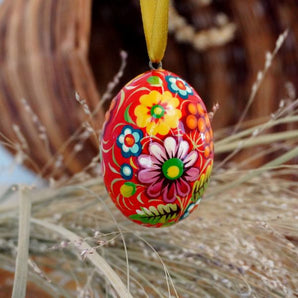 Red wooden Easter hand painted egg, Ukrainian Petrykivka painting