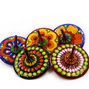 Handmade wooden spinning top, eco toy with traditional ukrainian painting