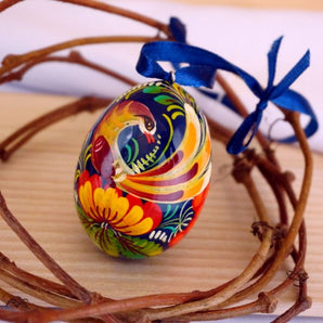 Wooden Easter egg pysanka with bird pattern