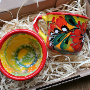 Colorful ceramic coffee cups with floral pattern -originally hand-painted