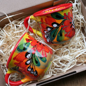 Colorful ceramic coffee cups with floral pattern -originally hand-painted