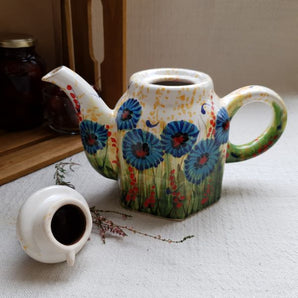 Hand-painted ceramic teapot with cornflowers, traditional handicraft