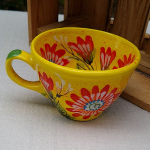 Hand-painted ceramic cup with flowers - handicrafts