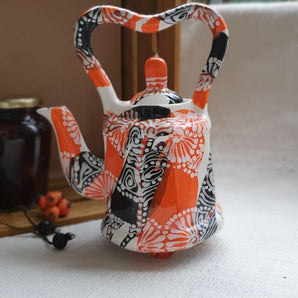 Design ceramic teapot with abstract painting