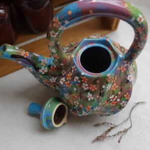 Ceramic teapot hand painted with small flowers