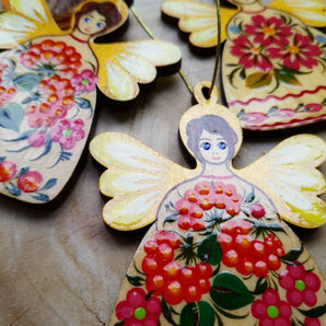 Christmas tree decoration angel with golden wings