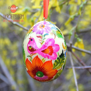 Easter egg hand painted on wood, traditional Ukrainian pysanka