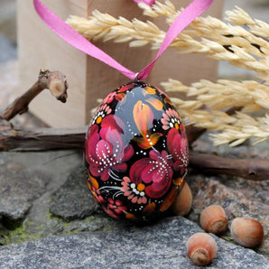 Beautiful wooden Easter egg Pysanka, delicate work