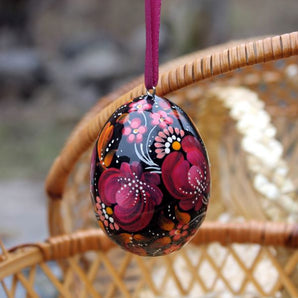 Beautiful wooden Easter egg Pysanka, delicate work